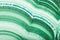 Blue line in green malachite texture