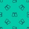 Blue line Short or pants icon isolated seamless pattern on green background. Vector