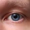 Blue male eye. Closeup