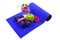 Blue mat with dumbbells green apple drink measuring tape