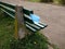 Blue medicine mask on park bench 3