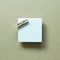 Blue memo pad with wooden clip on khaki background