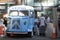 Blue minibus selling pizza at spitalfields market