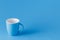 Blue monochromatic mug with copy space
