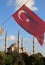 Blue Mosque Turkish flags view from M. Arkif Ersoy Sultanahment