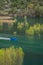 Blue motor boat on the lake