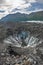 A blue moulin in an Alaskan glacier