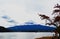 Blue mount Fuji behind the Autumn leaves on white backghround