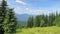 Blue mountains, green valley. Panoramic view of Ukrainian mountains in summer day. Carpathian, Ukraine, Europe. Mountain