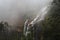 Blue Mountains and waterfall in heavy fog