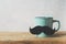 Blue mug with moustache, close up, fathers day concept on white background