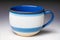 A blue mug. Tranquil Serenity. A Captivating Blue Mug. Generative AI