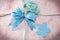Blue mulberry paper bow and flower with note on mulberry paper i