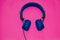 Blue Music Head Phones On A Retro Punk Pink Back Ground