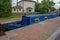 Blue narrowboat in a lock chamber