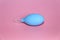 Blue nasal aspirator with glass tip. Suction of discharge from the baby spout