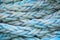 Blue nautical rope, close-up background texture