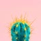 Blue neon cactus on a pink background