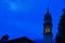 Blue night sky with bell tower