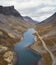 Blue northern lake in the harsh mountains in the north, view from above