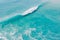 Blue ocean and surfing wave. Surfing dreams in tropics. Aerial view