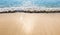 Blue ocean waves Sunlight  Reflection Sand Beach background