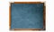 Blue old grungy vintage wooden empty school chalkboard or retro blackboard with weathered frame white background