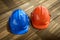 blue, orange hard safety helmet construction hat for safety project of workman as engineer or worker