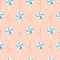 Blue an orange lolly pops and candies in a seamless pattern design