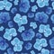 Blue orchid flowers seamless pattern on dark blue background