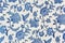 Blue ornate floral pattern on white cotton tablecloth.