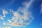 blue overlay clouds and beautiful blue sky background with clouds and sunlight beams