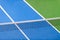 Blue paddle tennis net and hard court