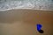 Blue pail on the beach