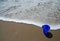 Blue pail on the beach