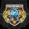 Blue paintball mask with guns in the center of wreath on shield. Sport logo for any team or tournament on black