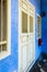 Blue painted shophouse facade