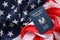 Blue Palestinian Authority passport on United States national flag background close up