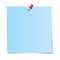 Blue paper note with red pushpin