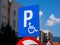 Blue parking sign for disabled persons close up shot