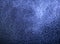 BLUE PARTICLES SWIRLING IN TURBULENT AIR