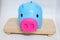 Blue pig coin jar, saving money, collecting money, white background