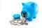 Blue piggy bank crying when opened to get coins