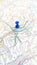 A blue pin stuck in Interlaken on a map of Switzerland portrait view