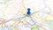 A blue pin stuck in Nimes on a map of France