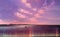 Blue pink lilac  sunset on dark sea water wave city light reflection nature landscape  seascape  skyline  On Horizon  silhouette