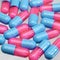 Blue and pink pills