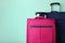 Blue and pink suitcases