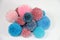 Blue and pink wool pompoms