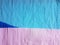 Blue pink wrinkled paper background silk surface empty blank sheets vivid colors